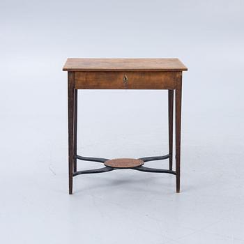 A late Gustavian burr-alder table, circa 1800.