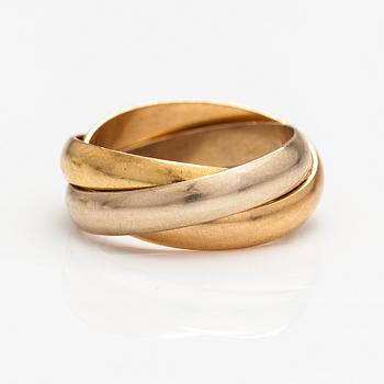 Cartier, les must de Cartier, an 18K gold "Trinity" ring. Marked Les must de Cartier, O 0796 I.