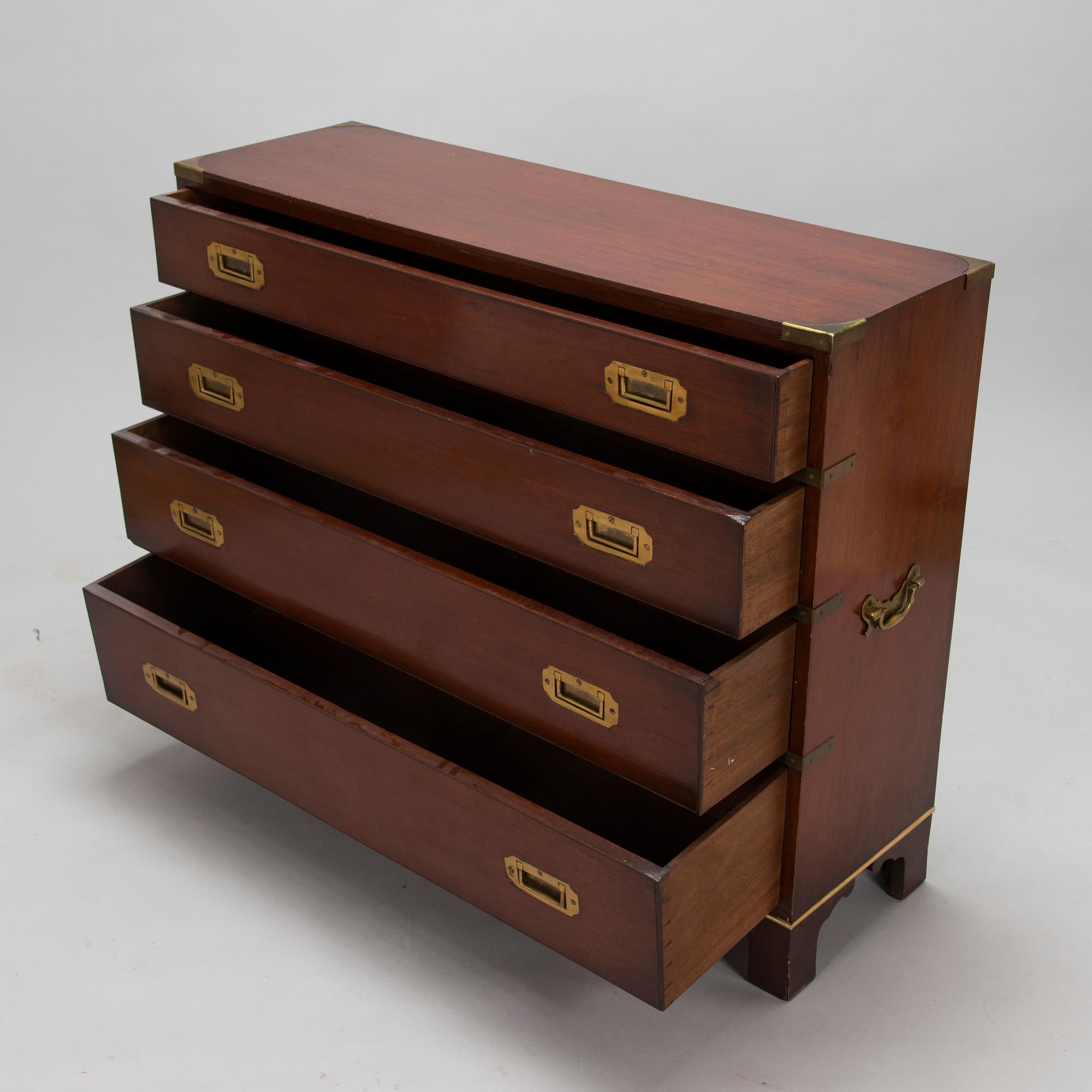 A chest of drawers, England, second half of the 20th century.