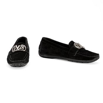 LOUIS VUITTON, apair of black suede loafers.