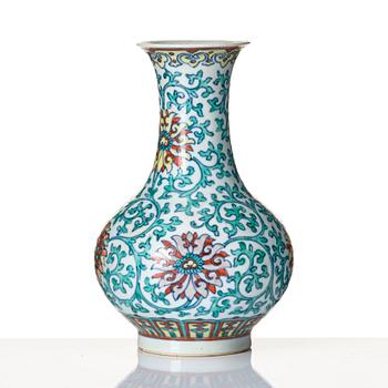 A doucai 'lotus' vase, Qing dynasty with Qianlong seal mark in underglaze blue.