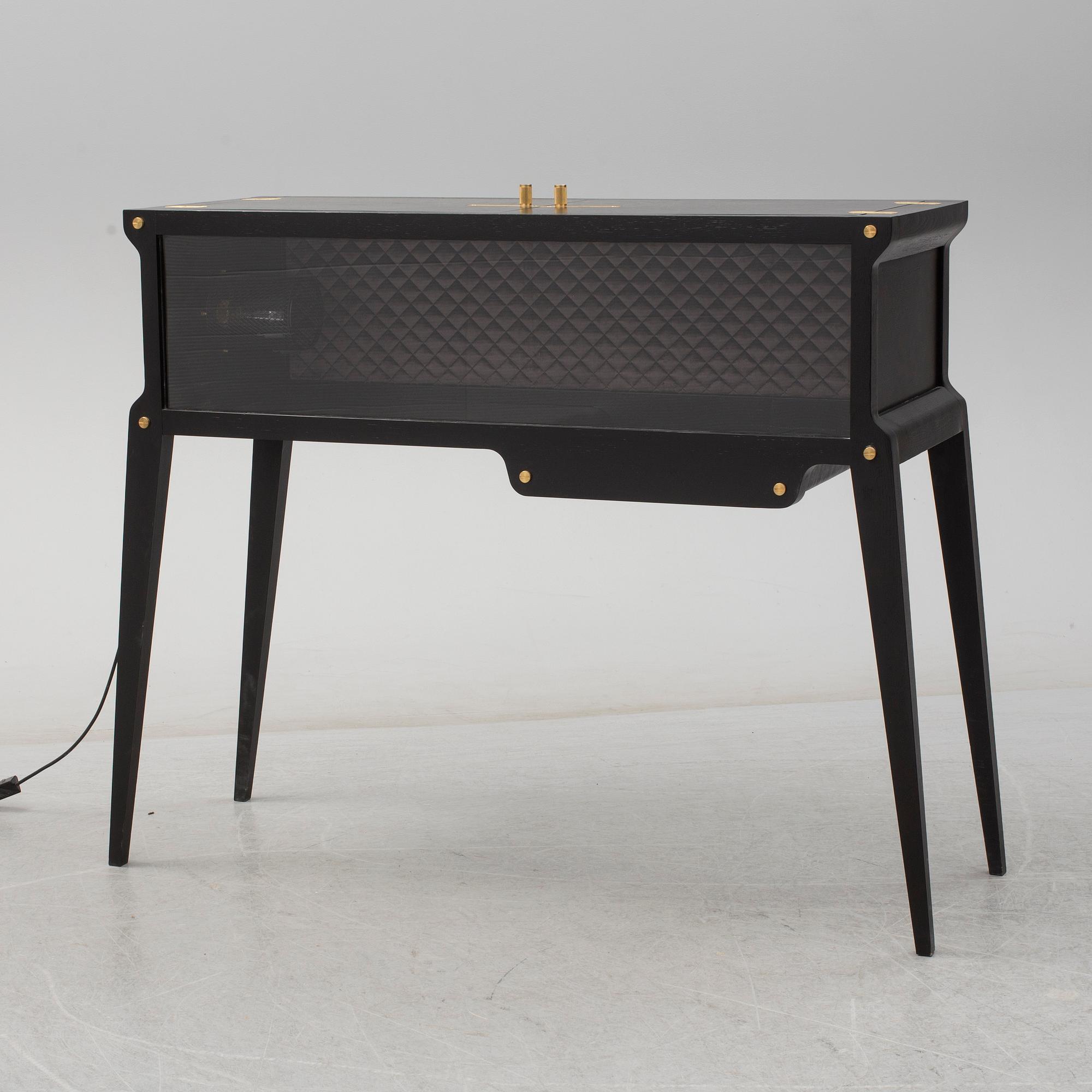 A 21st century 'The Rockstar Bar' cocktail cabinet, Buster & Punch, London.