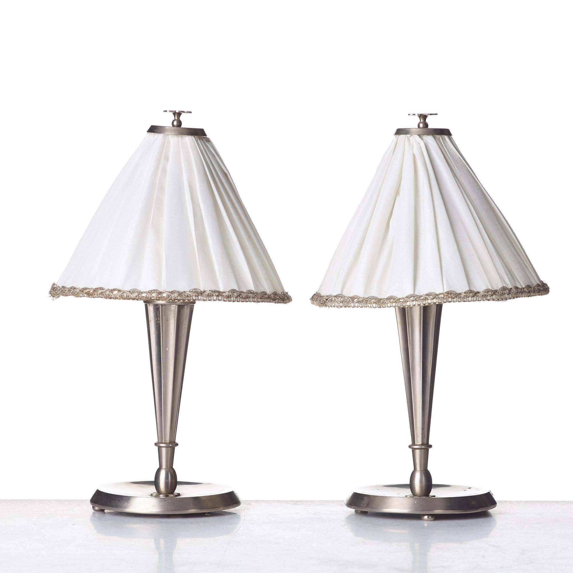 HARALD ELOF NOTINI, a pair of pewter table lamps by Böhlmarks, Stockholm 1920's-30's.