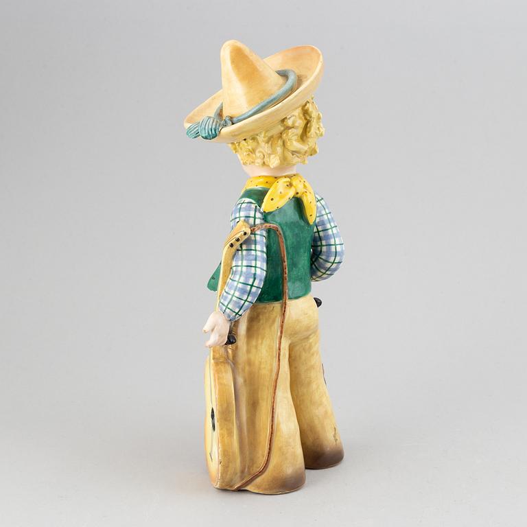 An Italian ceramic figure of a boy with guitar, probably 1930's.