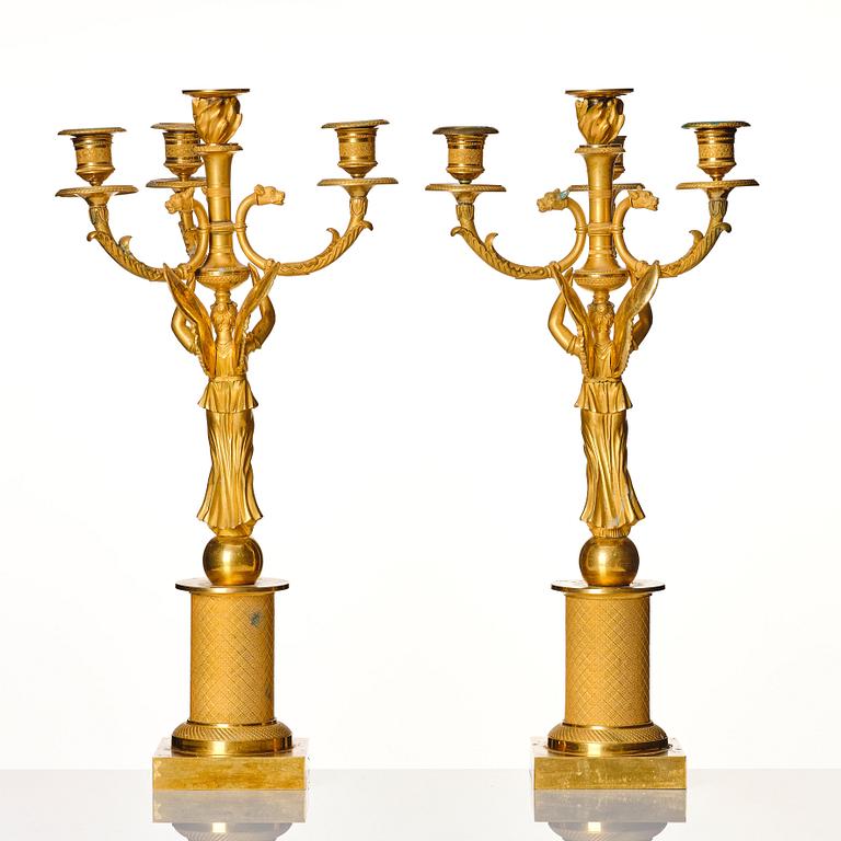 A pair of Empire candelabras for four lights, beginning of the 19th century.