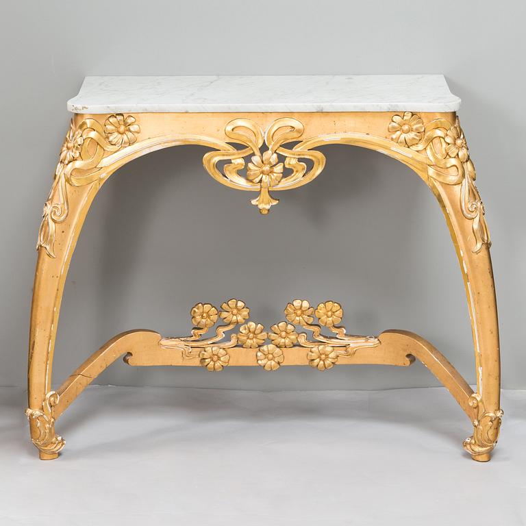 An Art Nouveau mirror with console table from early 20th century.
