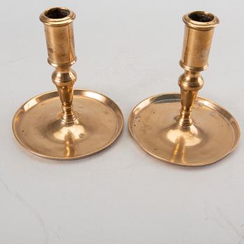 A pair of Swedish brass 18th century candlesticks.