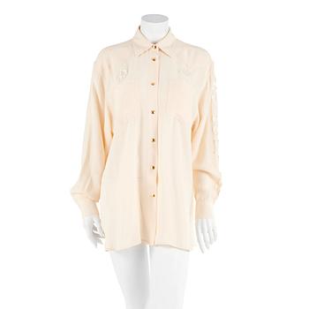 317. MOSCHINO jeans, a beige blouse with sequins. Size M.