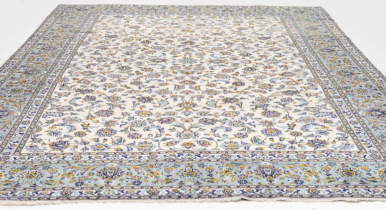 A carpet, Keshan, approx. 390 x 300 cm.