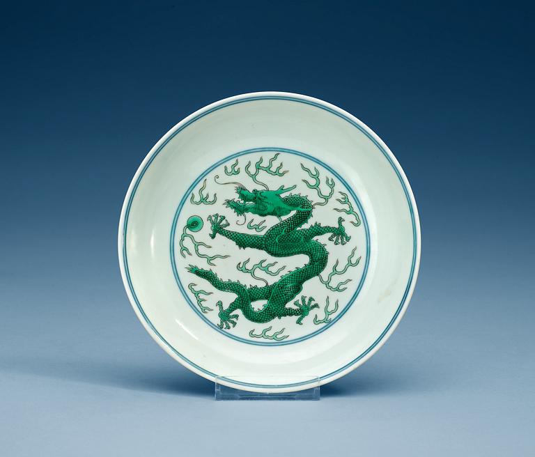 A green glazed dragon dish, Qing dynasty with Daoguangs seal mark and period.
