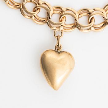 Armband 18K guld bismarcklänk, med berlocker.