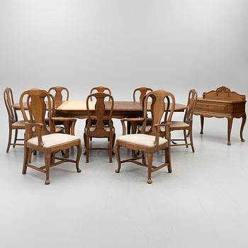 Dining table, 8 chairs, 2 armchairs, sideboard, Rococo style, early 20th century.