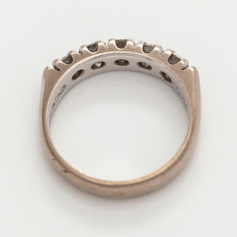 Ring, brilliant cut diamonds, 14K white gold. Korutyö Koski, Turku 2009.