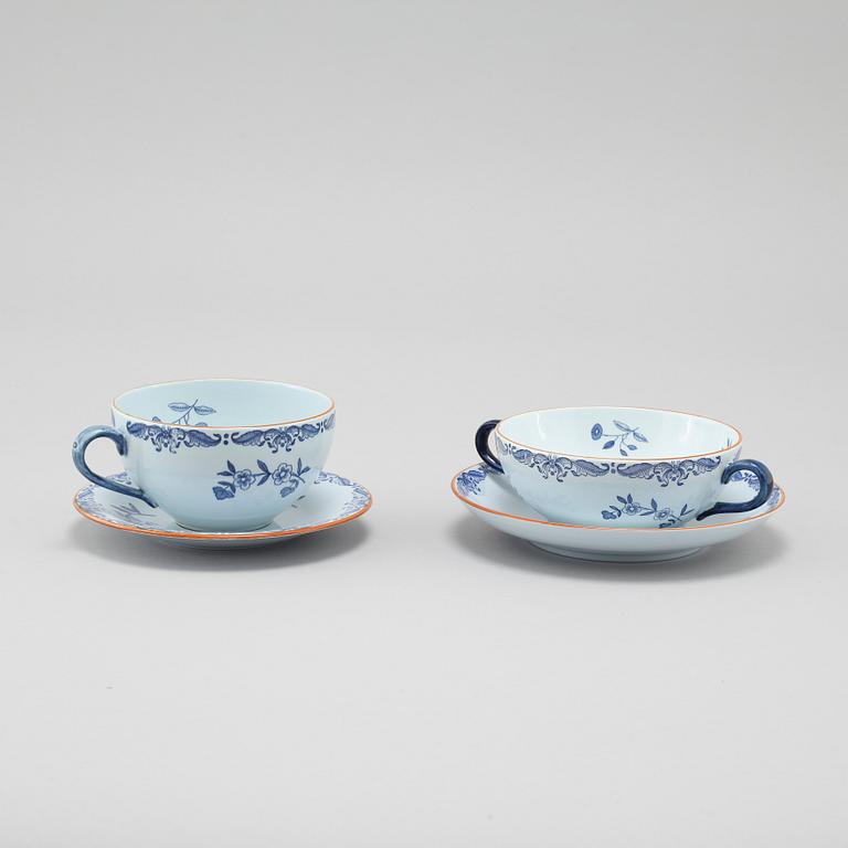 Seven "Ostindia" broth cups with sausers and chocolate cups with sausers in earthenware, Rörstrand, 20th century.