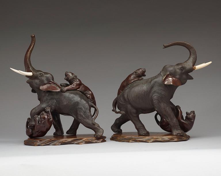 A pair of Japanese bronze sculptures of elephants, late Meiji (1868-1912).