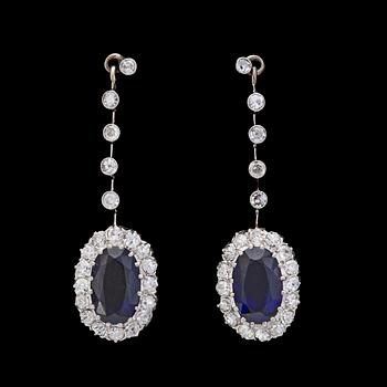 EARRINGS, oval cut blue sapphires and brilliant cut diamonds, tot. app. 0.80 cts.