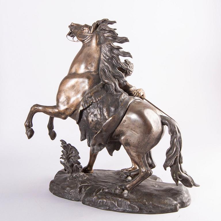 Guilliaume Coustou, after, a signed bronze sculpture  "Chevaux de Marly" from the second part of the 1800's.