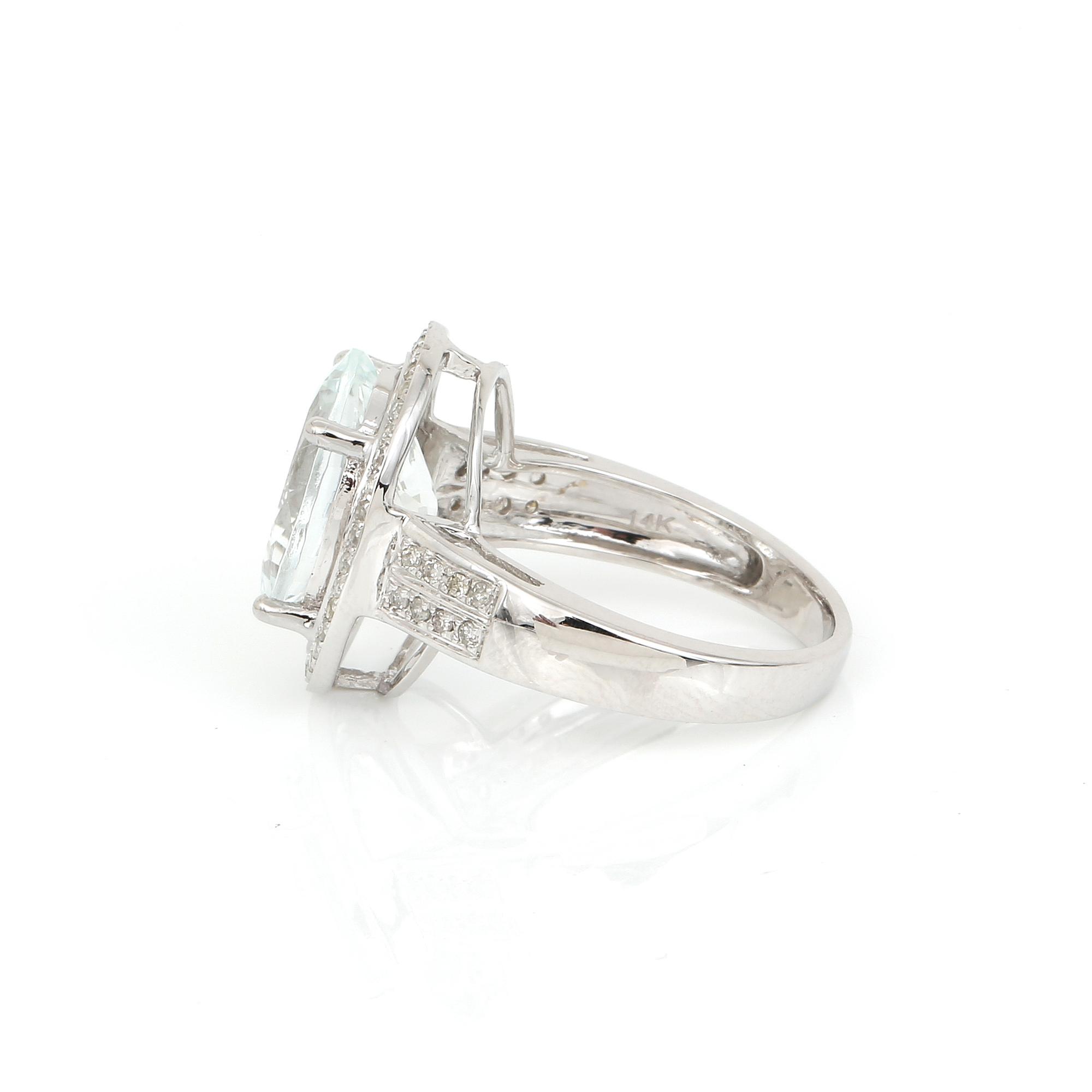 RING, 14K vitguld med ovalslipad goshenit ca 1,50 ct och små diamanter. Total vikt ca 4,83 g.