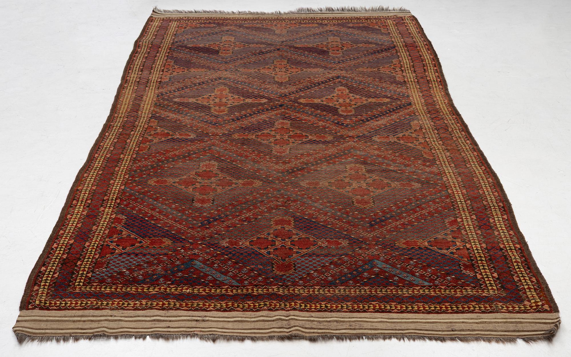 An antique Beshir carpet, ca 495 x 206 cm, around the year 1875.