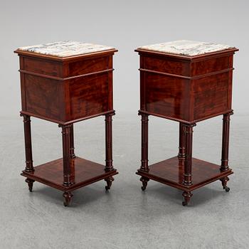 A pair of eclectic 20th century bedside tables.