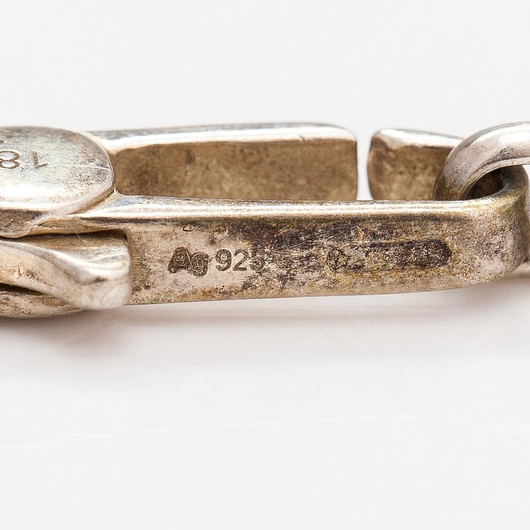 Gucci, A pair of earrings, bracelet, ring and necklace made of sterling silver. Marked Gucci, Made in Italy.