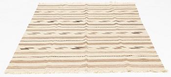A kilim rug, approximately 245 x 162 cm.