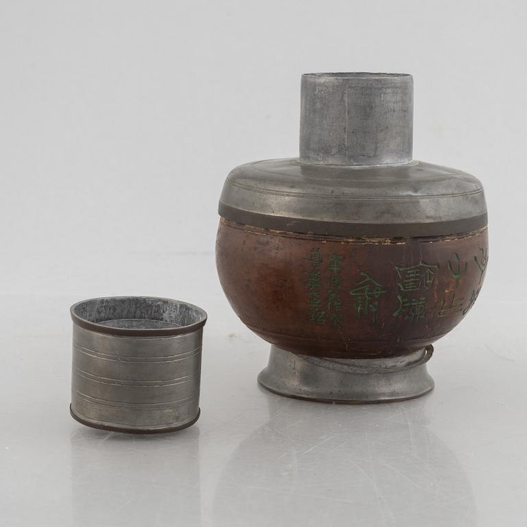 A Chinese pewter and wood tea caddie, early 20th century.