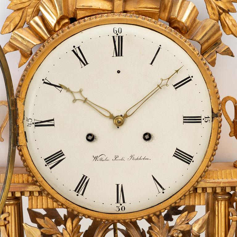 Wall-mounted clock, gilt, dial signed Wilhelm Pauli, Stockholm (active 1795–1816).