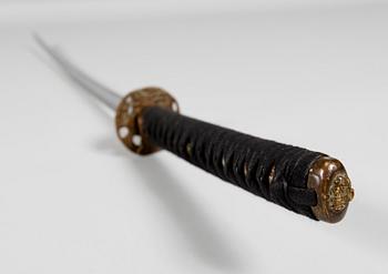 KATANA, orientalisk, 1900-talets andra hälft. TEXTÄNDRING: Orientalisk, 1900-talets andra hälft.