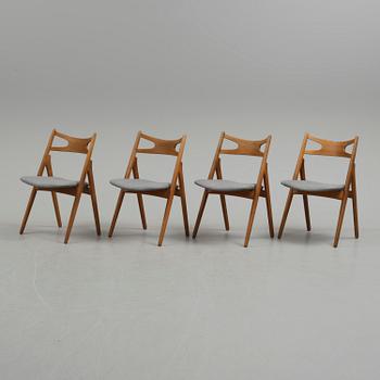 A set of four 'CH 29/Savbukkestolen' by Hans J Wegner, Carl Hansen & Søn, Denmark.