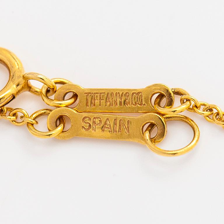 Tiffany & Co, Elsa Peretti, an 18K gold 'Open Heart' necklace.