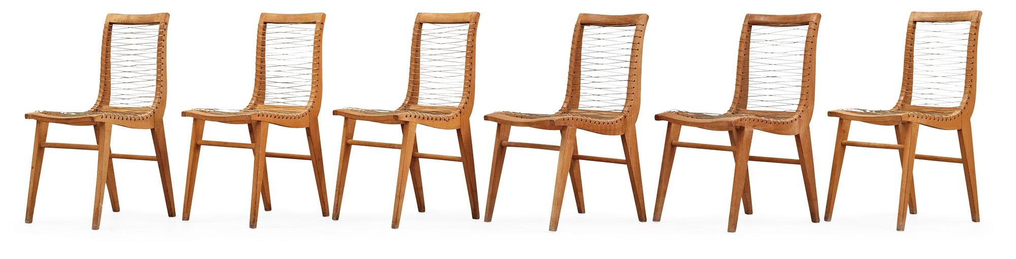 A Louis Sognot set of six ash, metal and rubber chairs, France 1950's.