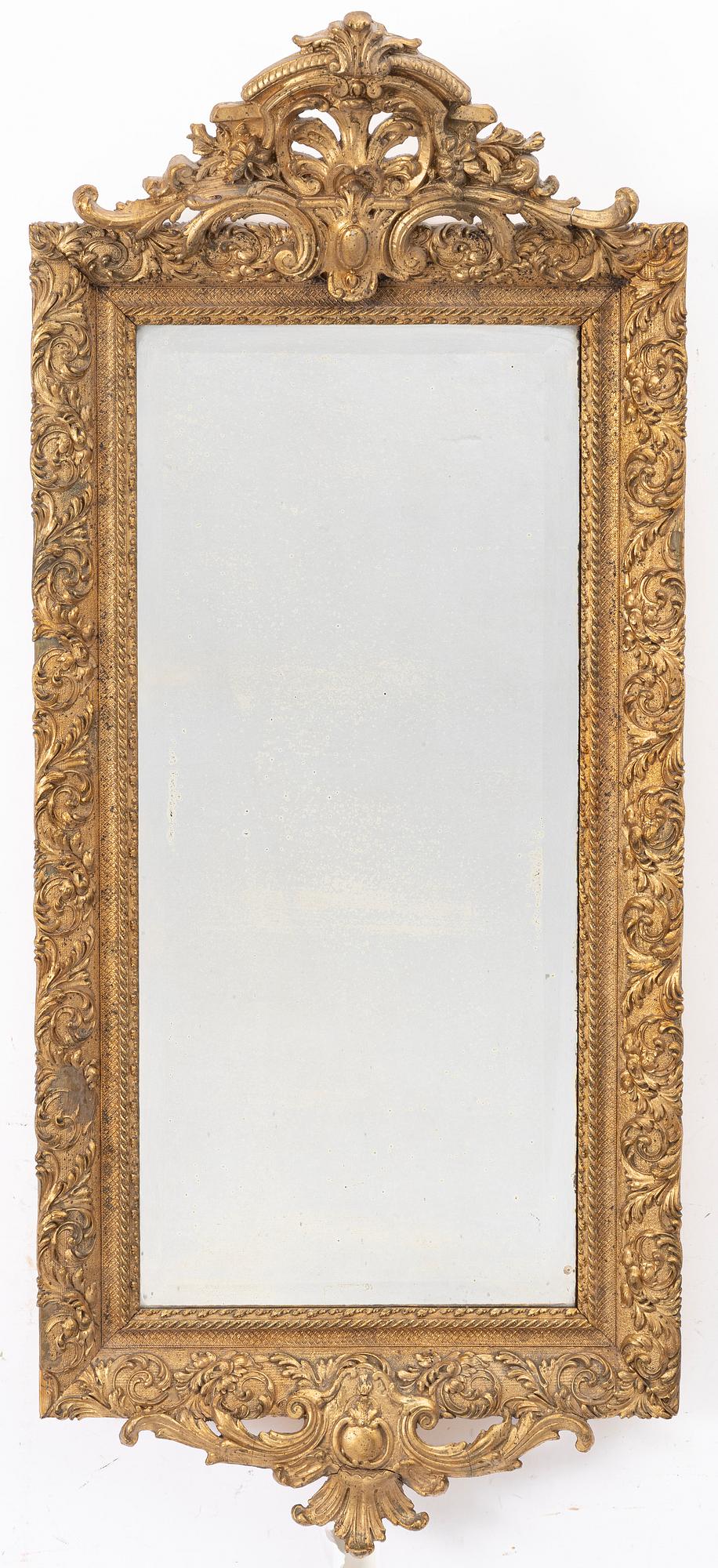 A mirror, circa 1900.