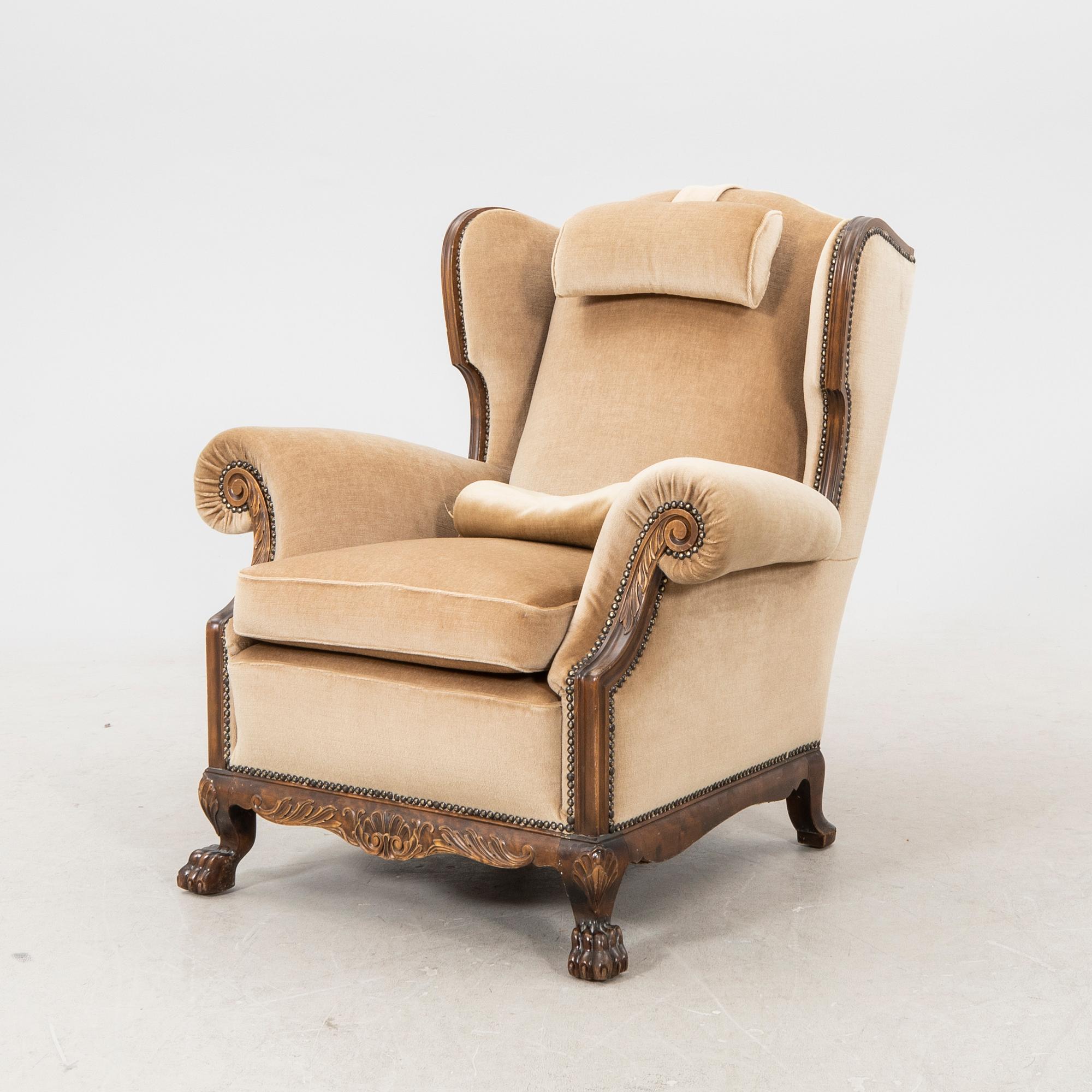 A fabric upholstered easy chair from the second half of the 20th Century.
