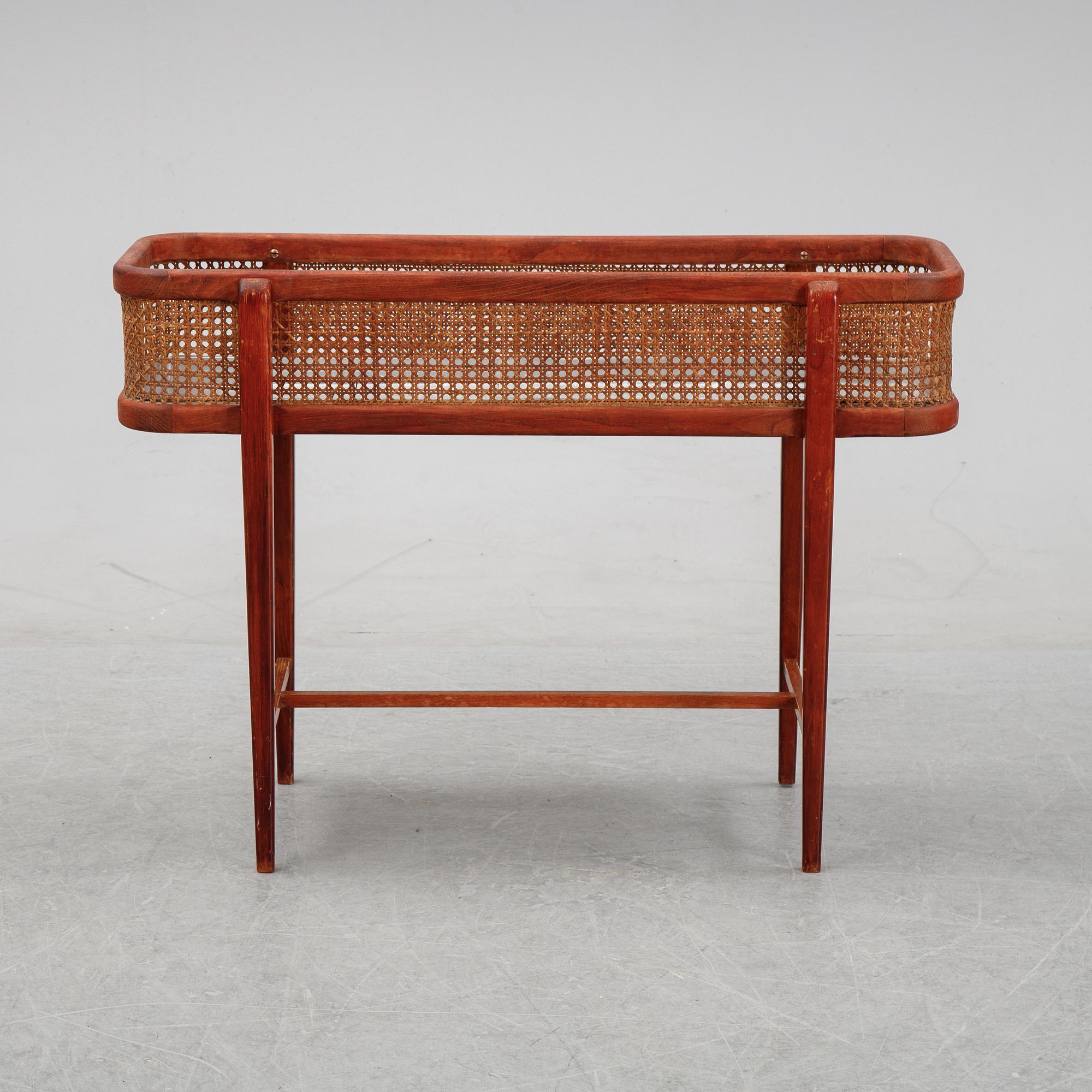 A flowertable with rattan details, late 20th century.