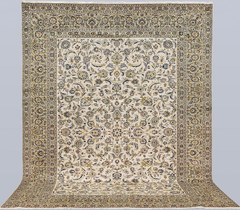A Keshan carpet, approx. 388 x 285 cm.