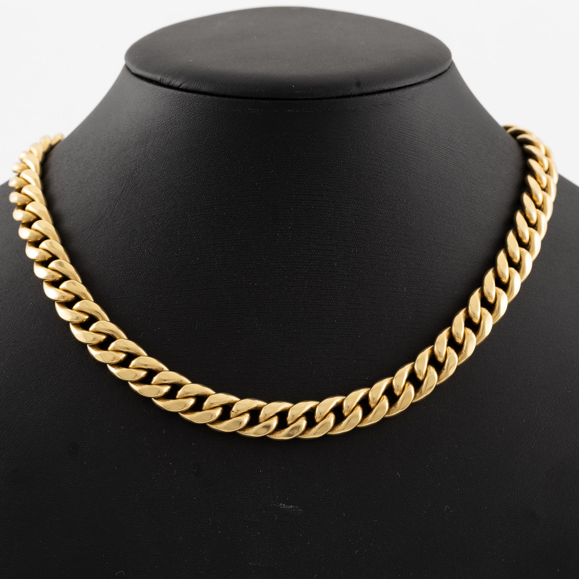 Necklace 18K gold with cabochon-cut sapphires.