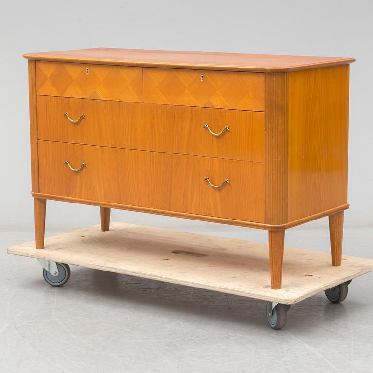 A 1940's elm Swedish Modern chest of drawers.