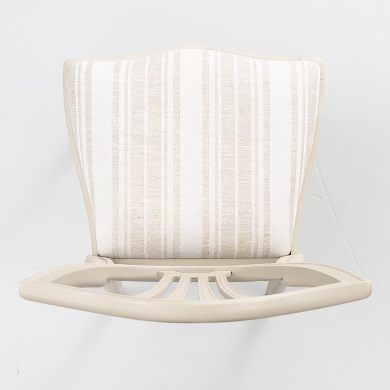 A dining table with 10 chairs, Gustavian Style dining suite, second half of the 20th century.