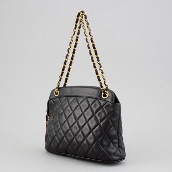 Chanel, a black quilted leather handbag, 1980's.