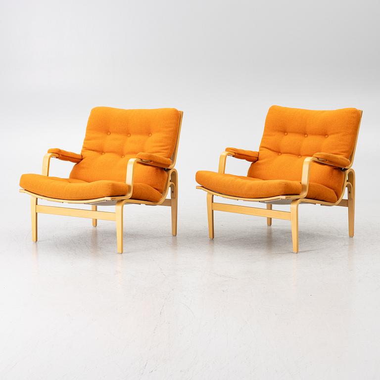 Bruno Mathsson, a pair of 'Ingrid' armchairs, Dux.