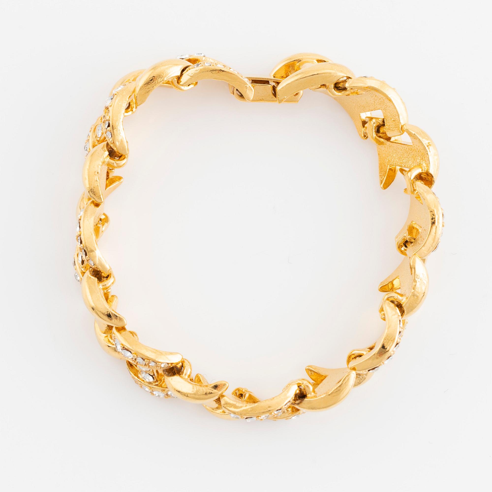 Oscar de la Renta bracelet, yellow metal with strass.