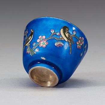 A set of 12 Chinese silver and enamel cups with saucers, decorated with birds and butterflies, China,early 20th Century.