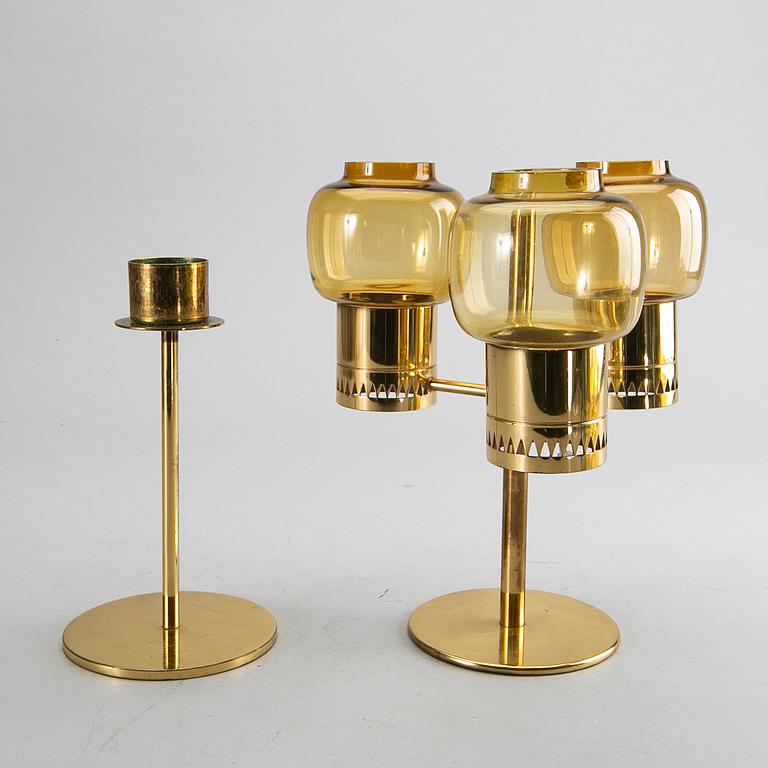 HANS-AGNE JAKOBSSON, a set of two brass candle sticks and extra glass.