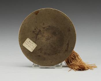 An archaistic bronze mirror, Ming dynasty (1368-1644) or older.