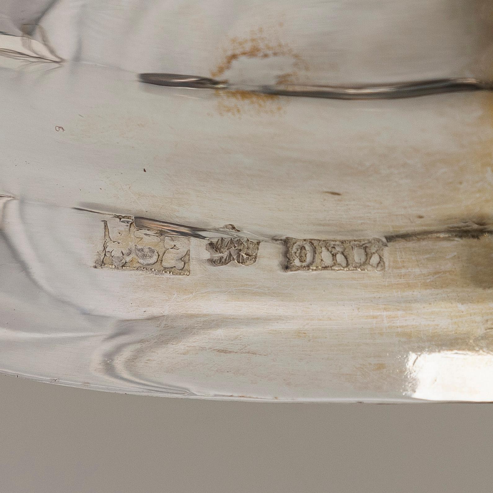 Slevar, 4 st, silver samt trä, en stämplad Olof Robert Lundgren Åbo 1857.