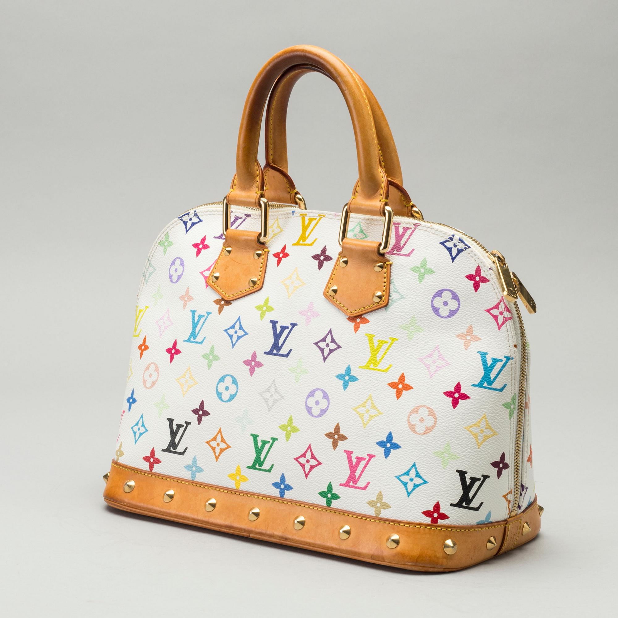A LOUIS VUITTON ALMA BAG.