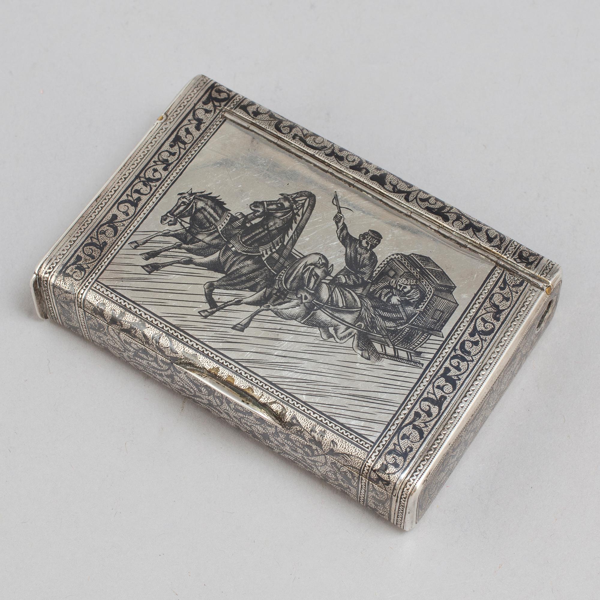 A parcel gilt silver case with niello, assaymaster Anatolij Artsybashev, Moscow 1889.