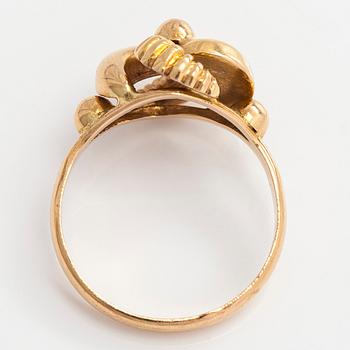 A 14K gold ring.