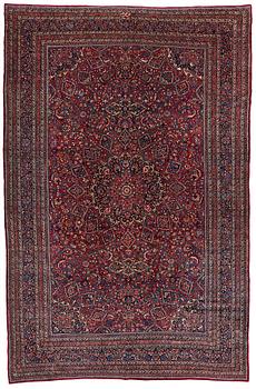 277. A CARPET,  a semi-antique Mashad, ca 544,5 x 356 cm, signed "Work by Makhmalbaf".